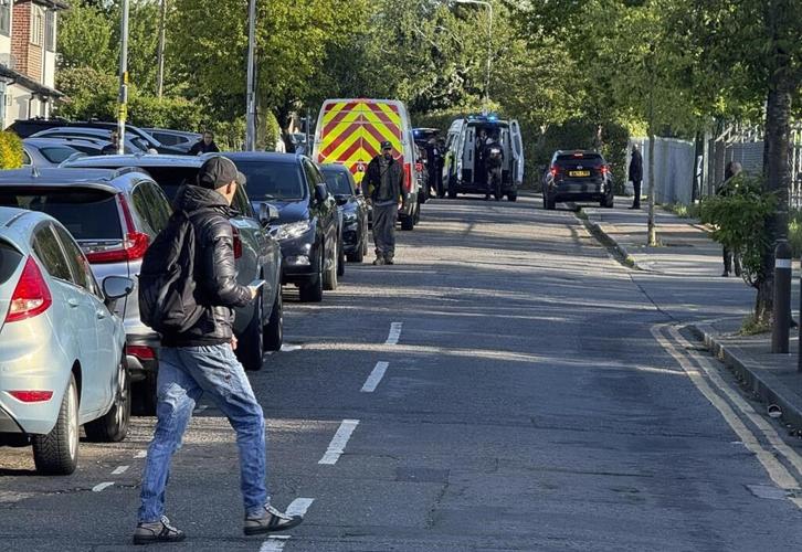 UK police arrest man wielding a sword in east London. 5 people are taken to the hospital