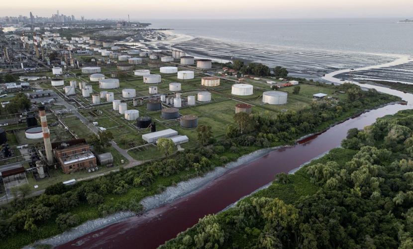 ‘It looks like a stream of blood.’ A river near Buenos Aires turns red, sparking fears of toxic leak