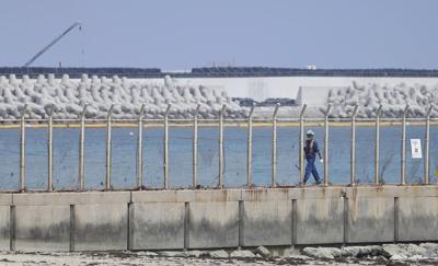 Japan's top court orders Okinawa to allow a divisive government plan to build US military runways