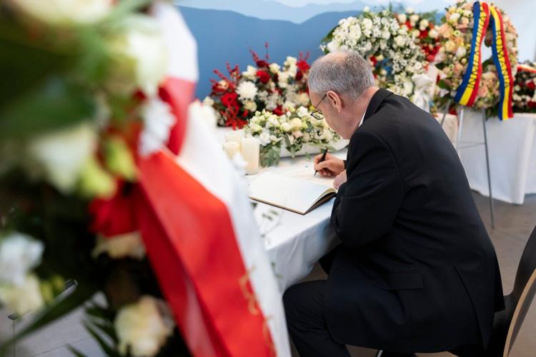 Switzerland honors the victims of the deadly Alpine bar fire in a national day of mourning