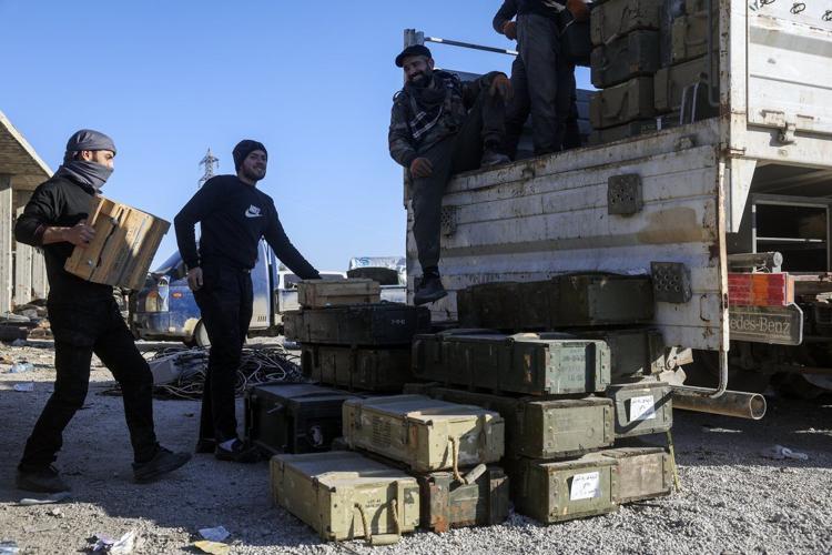 Syria launches counterattacks in an attempt to halt insurgency, as Iran's top diplomat meets Assad