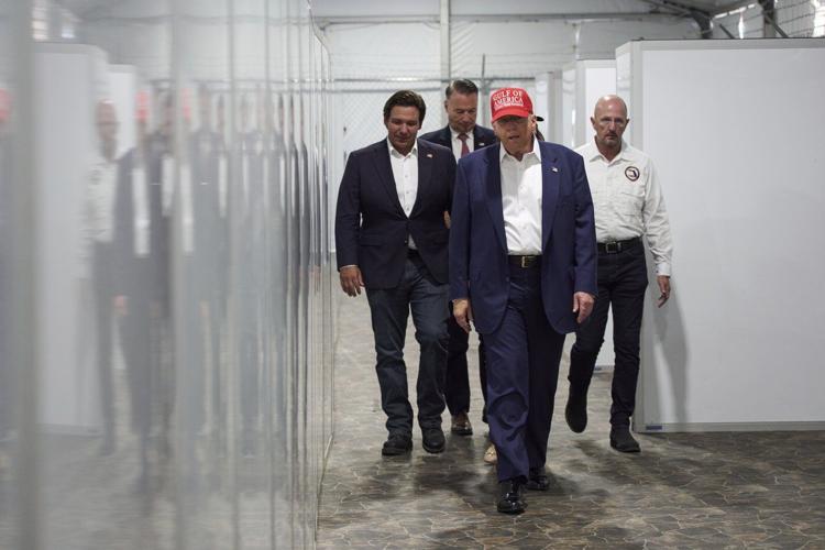Trump tours Florida immigration lockup and jokes about escapees having to run from alligators