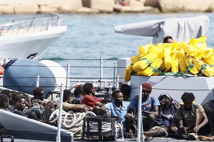 Italy approves new migrant detention as talk turns to naval blockade to prevent launching of boats