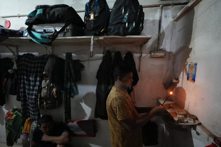 How one Indian textile worker copes with extreme heat in factory work and cramped living quarters