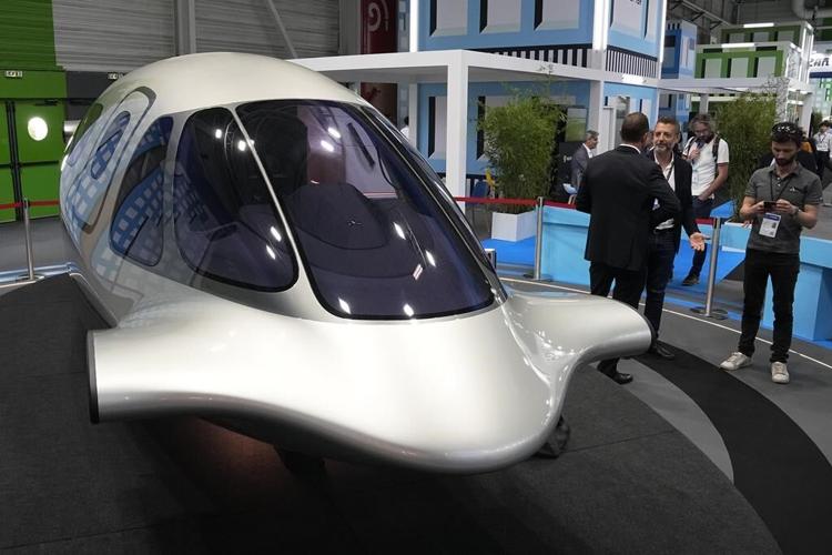 Lean green flying machines take wing in Paris, heralding transport revolution