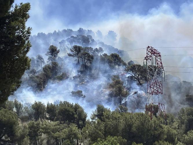 Wildfire near Marseille suspends flights, prompts stay-at-home orders