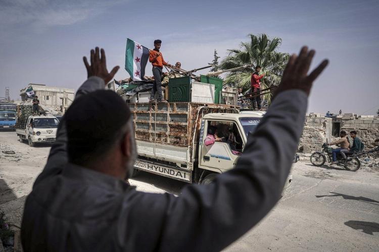 AP PHOTOS: Displaced Syrians Return Home
