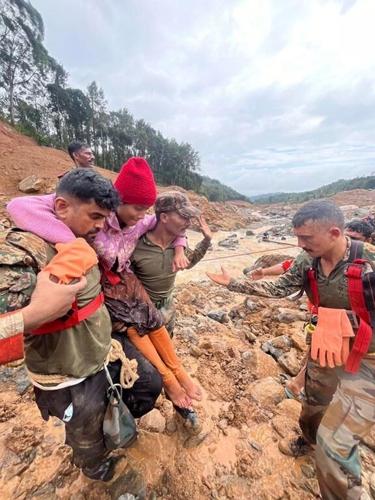 Rescuers search through mud and debris as deaths rise to 151 in landslides in southern India