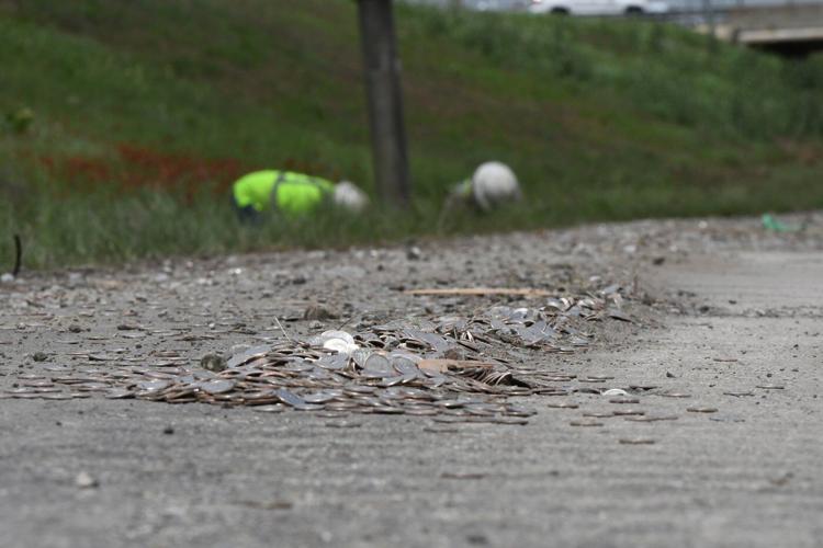 Cha-ching! Millions of dimes spill onto Texas highway after truck rolls