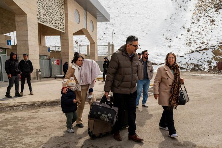 Iranians grapple with whether to flee the country because of the war