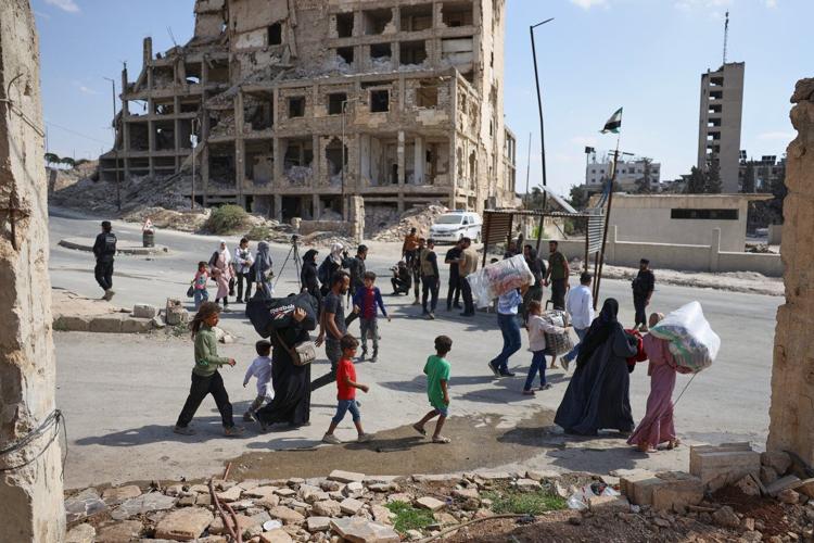 Cautious calm in Aleppo after clashes between Syrian forces and Kurdish fighters