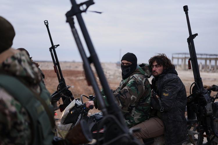 Syrian government forces enter northern towns after Kurdish fighters withdraw