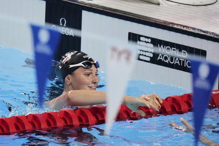 Canada's McIntosh wins second gold at world swimming championships