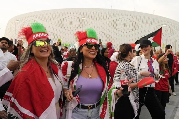 At World Cup, women fans shrug off worries over dress codes