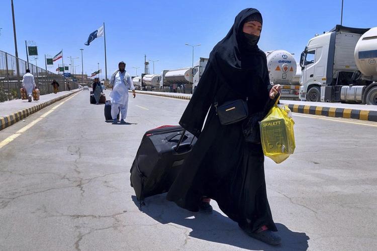 Photos show efforts to evacuate foreigners from the Israel-Iran conflict