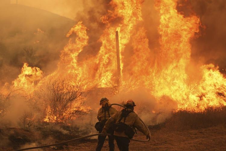 Rapidly spreading brush fire prompts an evacuation order for thousands north of Los Angeles
