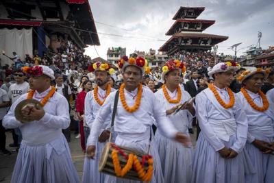 Festival season starts in Nepal with devotees honoring a living goddess