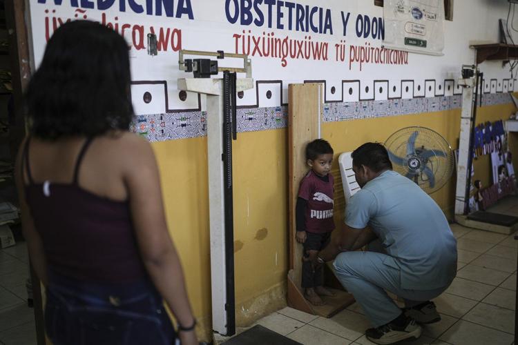 Residents of a remote island disputed by Colombia hope their Peruvian government won't forget them