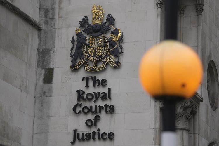 Prince Harry claims vindication in court victory as judge finds British tabloid hacked his phone