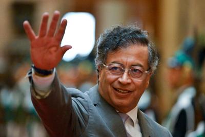 Colombian president aims to reduce drug violence and weaken rebels by paying farmers to switch crops