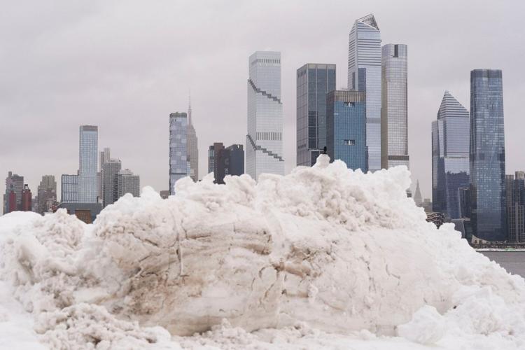 Northeast US digs out from brutal storm that disrupted flights and canceled school