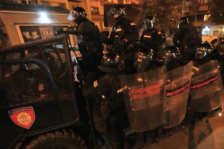 Police chase anti-government protesters in Serbia as president pledges crackdown