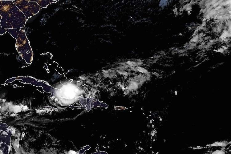 Tropical Storm Oscar disintegrates en route to the Bahamas after killing 7 people in Cuba