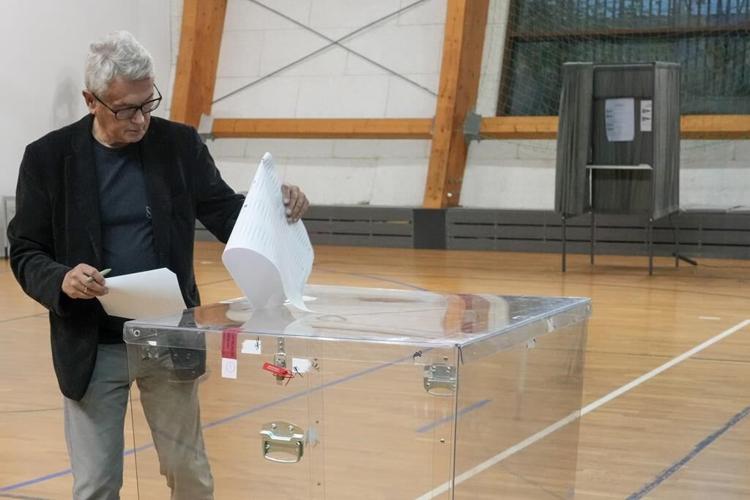 Poles vote in a high-stakes election that will determine whether right-wing party stays in power