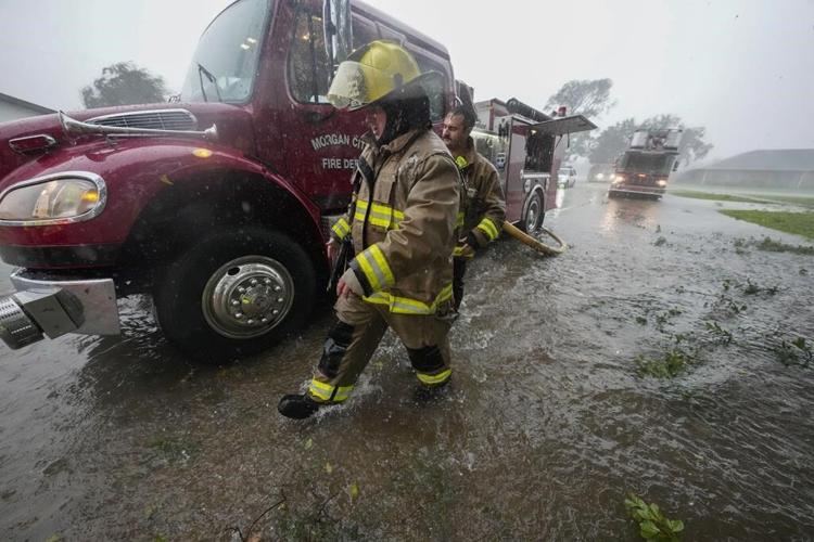 Francine weakens moving inland as the storm leaves behind flooding and widespread power outages