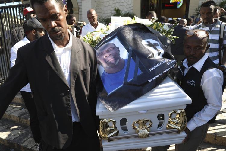 Mourners bury journalist killed in one of Haiti's worst attacks on reporters