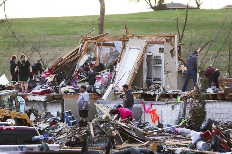 Residents begin going through the rubble after tornadoes hammer parts of Nebraska and Iowa