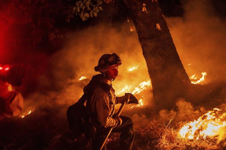Wildfire in Oregon destroys 4 homes, threatens thousands more, as flames spare California wineries
