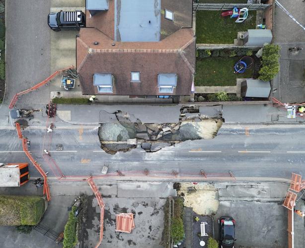 Sinkhole opens up on the main street of an English village