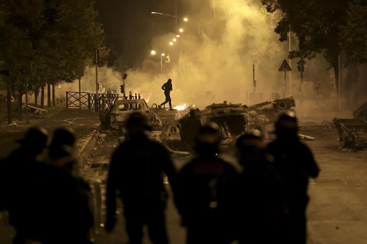 600 arrested and 200 police officers hurt on France's 3rd night of protests over teen's killing