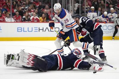 Draisaitl has 2 goals and McDavid 4 points as the Oilers end the Capitals' 5-game winning streak