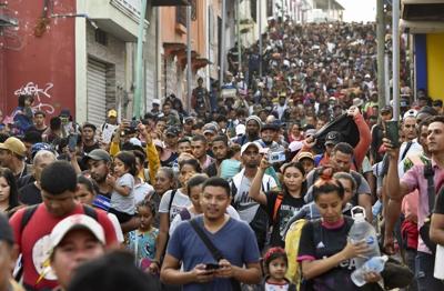 Mexican and Guatemalan presidents meet at border to discuss migration, security and development
