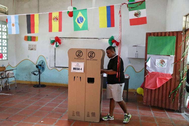 Colombians vote in a presidential runoff that pits an outsider against a progressive