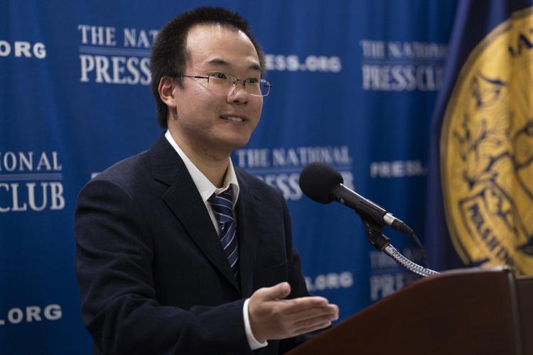 Son of Chinese journalist jailed for espionage calls for his father's release