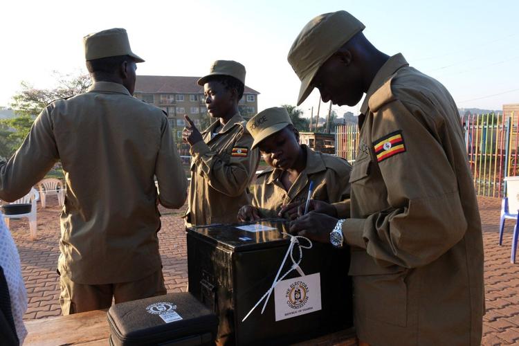 Photos show voters going to the polls in Uganda's presidential election
