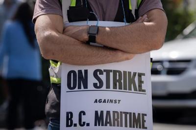 Union warns against Ottawa interfering in B.C. port workers strike as talks continue