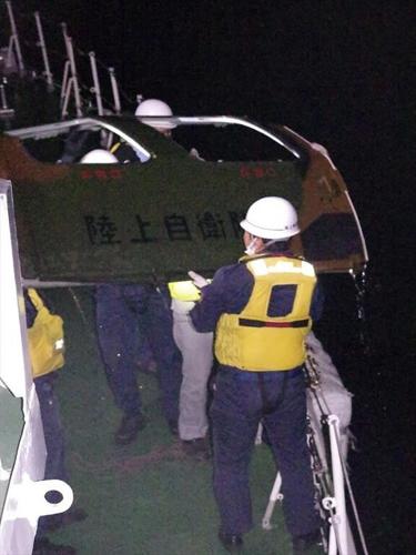 Debris found in search for Japanse army copter with 10 crew