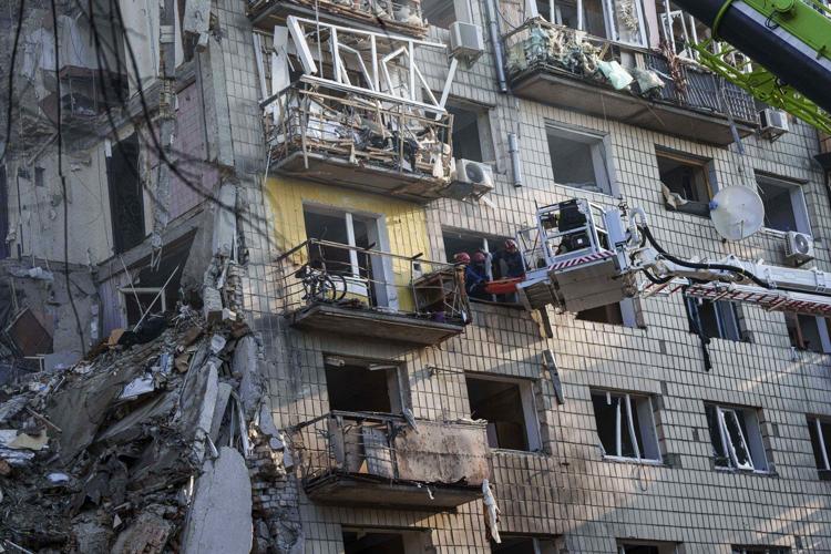 Photos of a combined Russian missile and drone attack in Kyiv overnight Tuesday