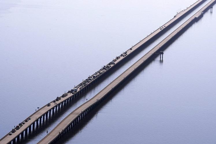 Multiple car crashes close 24-mile-long bridge outside of New Orleans after sudden fog