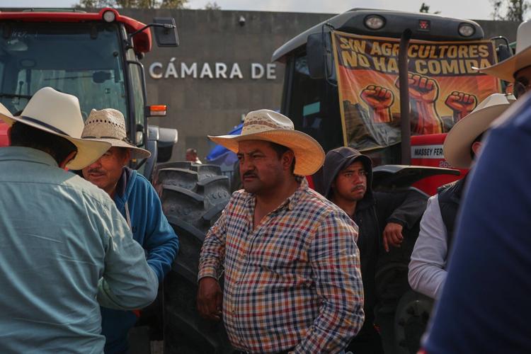 Farmers block Mexico's Congress with tractors in protest against new national water law proposal