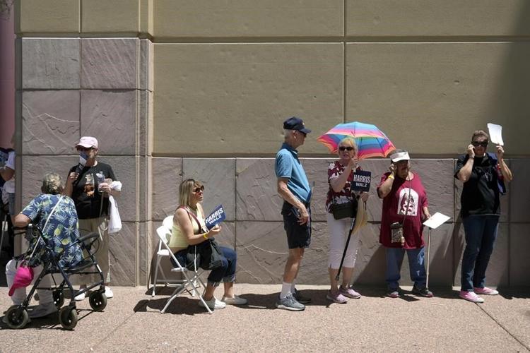 Kamala Harris and Tim Walz campaign in Arizona as they fight to gain