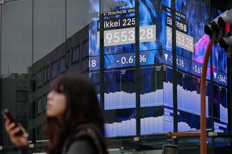 Asian shares gain with most markets closed for May Day, while oil holds steady at $111 a barrel