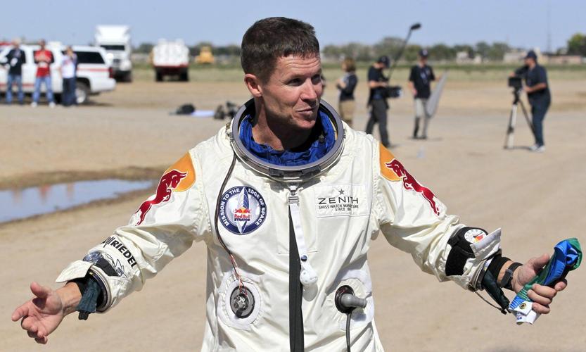 Witnesses to Felix Baumgartner's fatal paragliding crash heard large boom as it spun to the ground