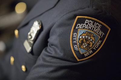 Two NYPD officers are charged with burglary and forcibly touching a sex worker
