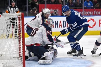 Blue Jackets down 'outworked' Maple Leafs 4-3 to spoil Woll's home debut