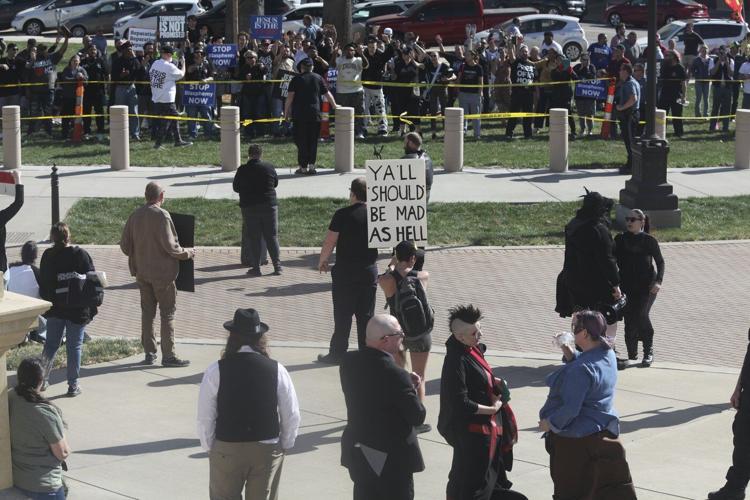 Satanist leader's attempt to hold Black Mass in Kansas Statehouse sparks chaos and 4 arrests